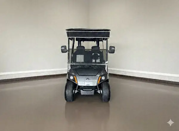 Gray Yamaha golf cart in the showroom, front view