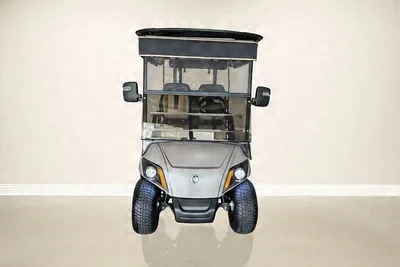 Front of the gray Yamaha Gray & Gray golf cart with a black roof