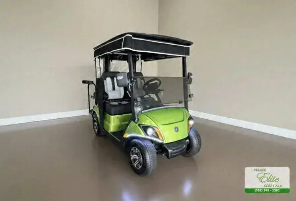 Lime green Yamaha golf cart with gray seats