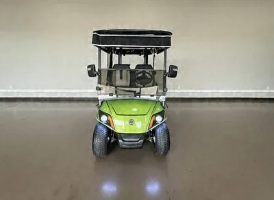 Front of the lime green Yamaha Green & Gray golf cart with LED headlights