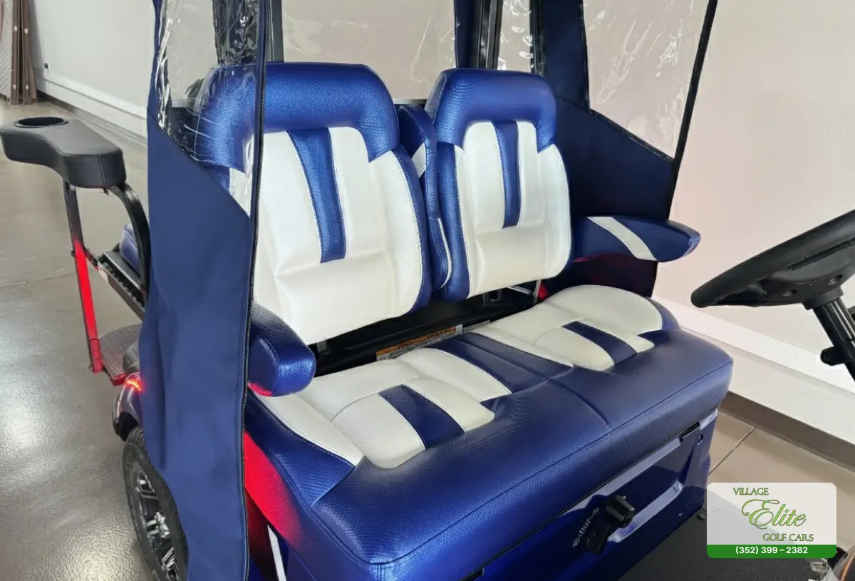 Yamaha Golf Cart Blue & White Seats – Comfortable and stylish blue and white seats designed for a superior golfing experience.